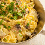 Linguini withAlfredo sauce mushrooms and parsley vegan recipe