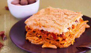 Greek vegan pastitsio with béchamel made from almond milk and olive oil