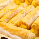 Photo of baked-potatoes puree rolls with leeks and nutmeg. A vegan and vegetarian recipe from All About Vegans