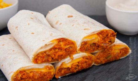 Vegan burritos with minced soy, colorful peppers & homemade vegan sour cream
