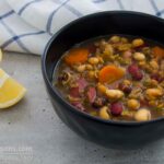 Photo of a bowl of "Polyspori" or "legume" soup. A vegan seed-based soup, ie a mixture of legumes and cereals.
